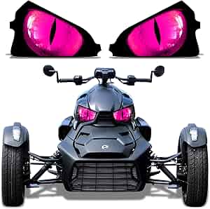 A sleek black go-kart with striking purple eyes above it.