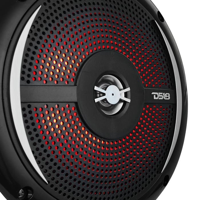 Close-up of a black and red car subwoofer speaker.