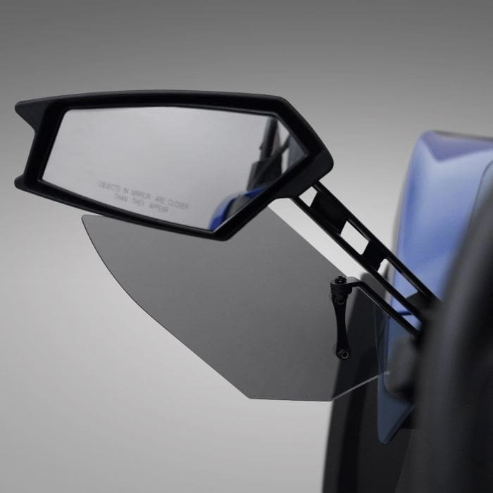 Close-up of a modern side mirror on a vehicle.