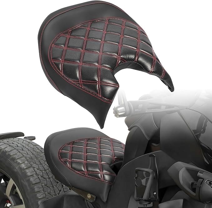Custom motorcycle seat with black leather and red stitching.